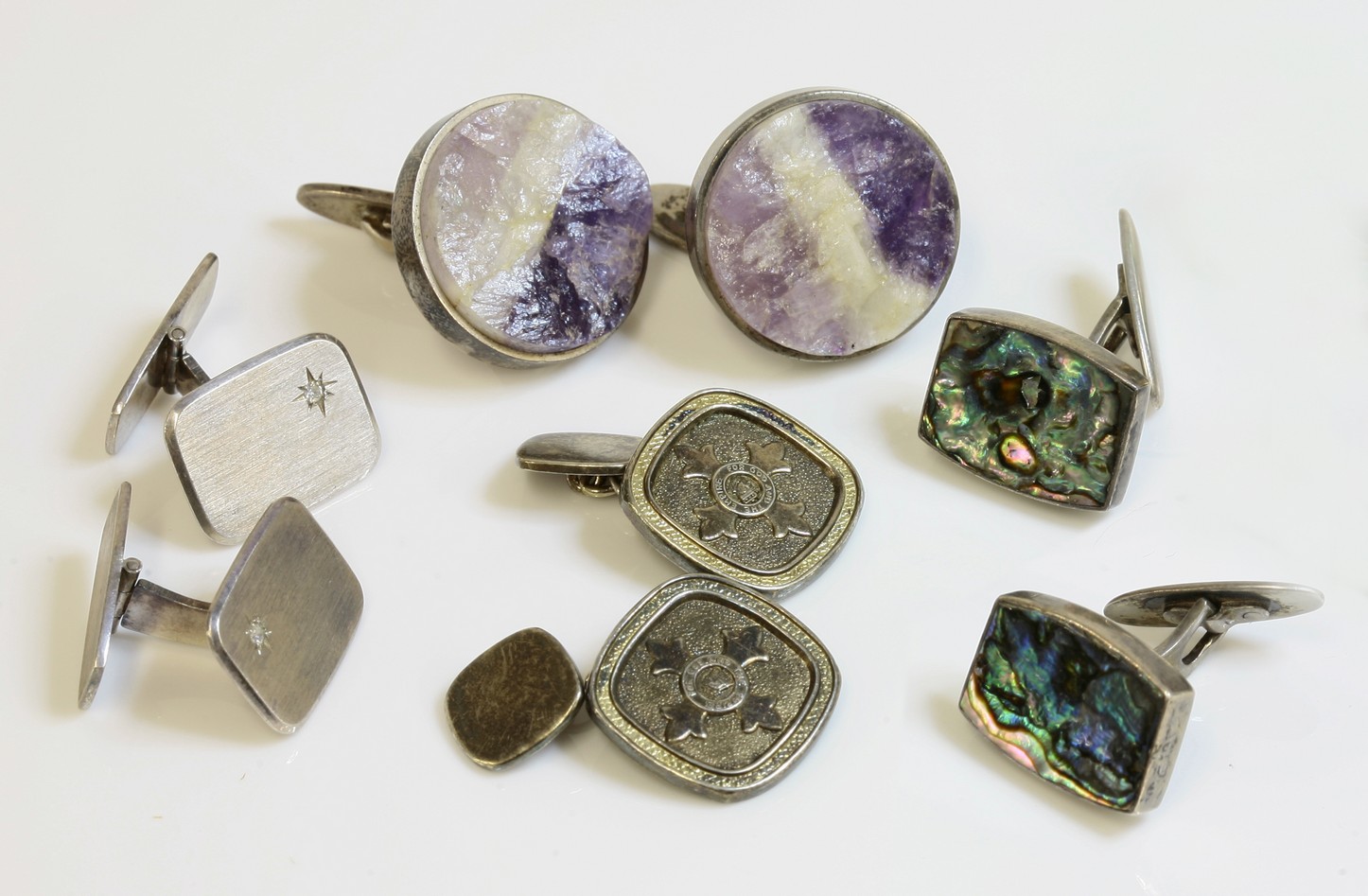 A pair of Danish sterling silver cufflinks, c.1970,
with large circular heads, each set with an