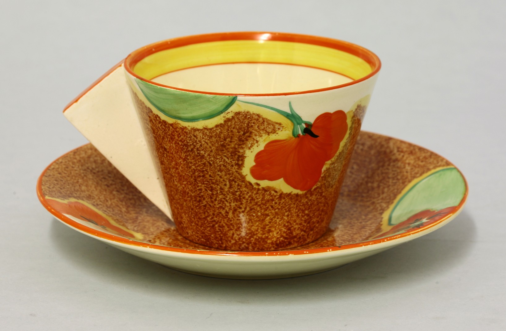 A Clarice Cliff 'Nasturtium' breakfast cup and saucer