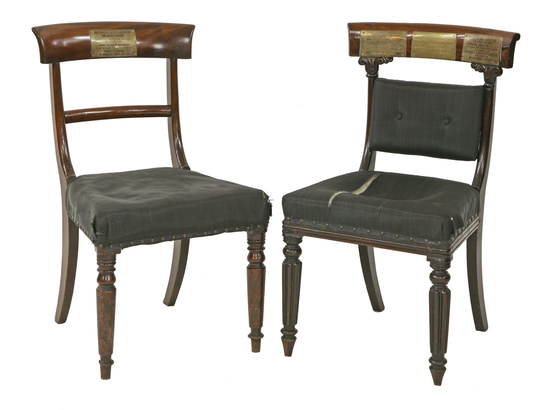 Two Victorian mahogany dining chairs,
each with brass plaques commemorating visits to Hedges &