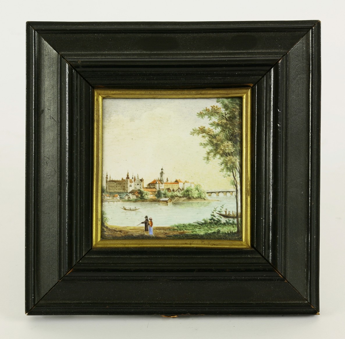 A Continental enamel plaque,  
decorated with a landscape of figures in the foreground, boats, a