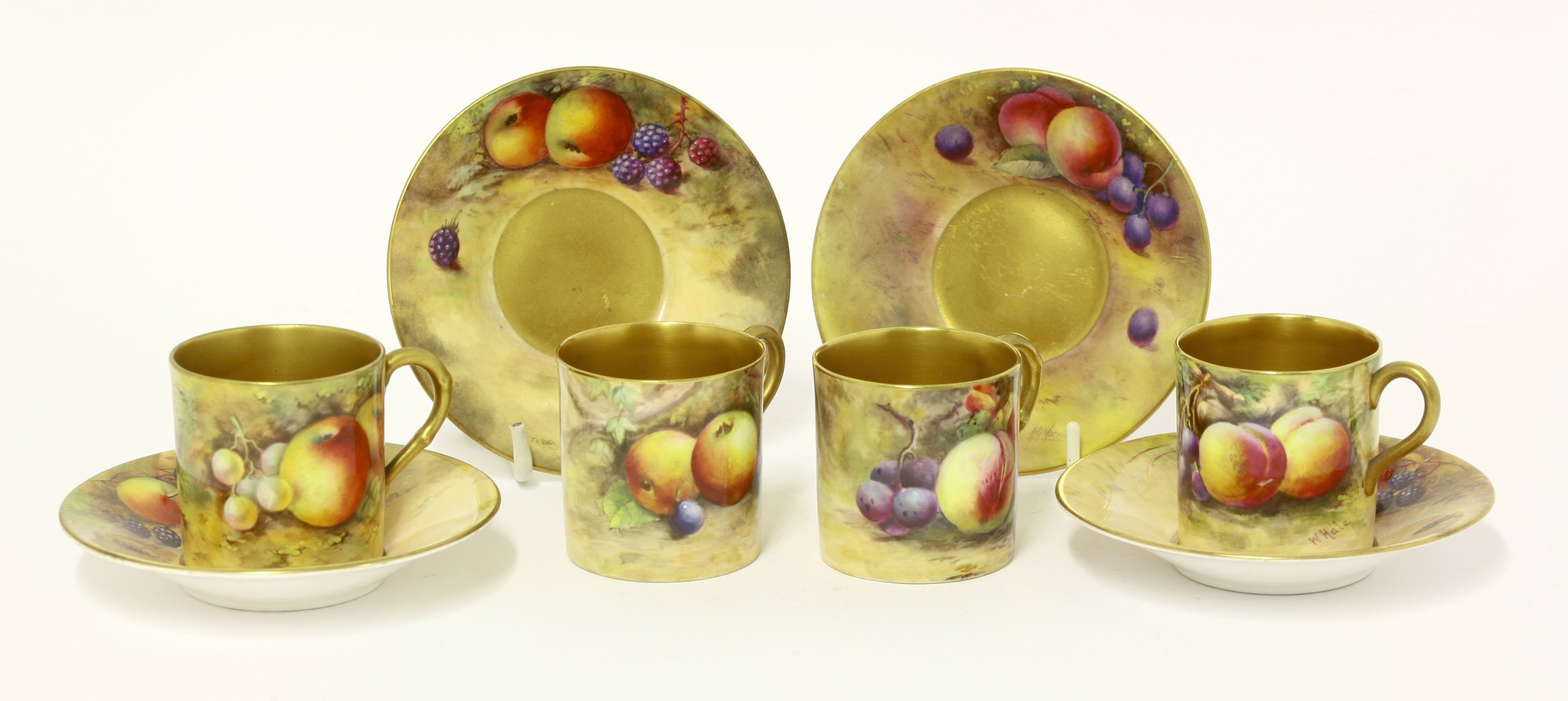 A set of four Royal Worcester Coffee Cans and Saucers,
1922 and 1923, each painted by W H Austin,