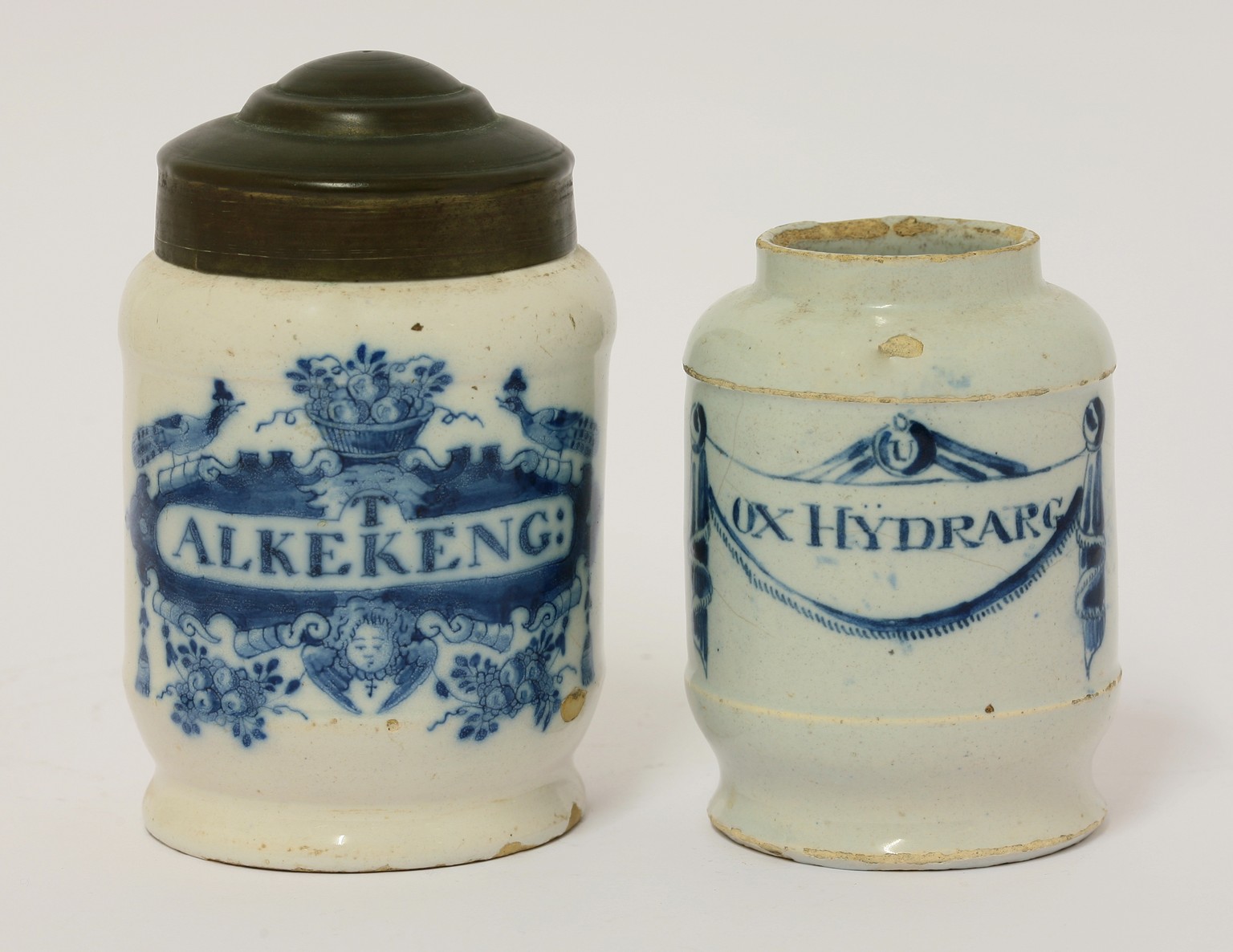 Two Dutch delft small Drug Jars,  
early 18th century, one inscribed 'T Alkekeng' in a cartouche