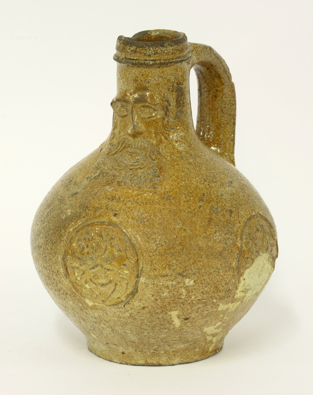 A salt-glazed stoneware Bellarmine,
probably 17th century, of typical bellied form with a bearded