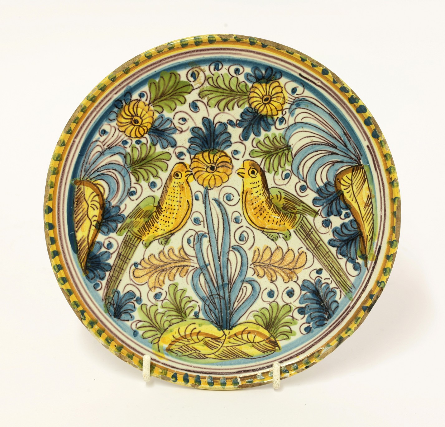 A Savona Tazza,  
c.1680, of small size, painted in ochre, brown, blue, green and manganese with two