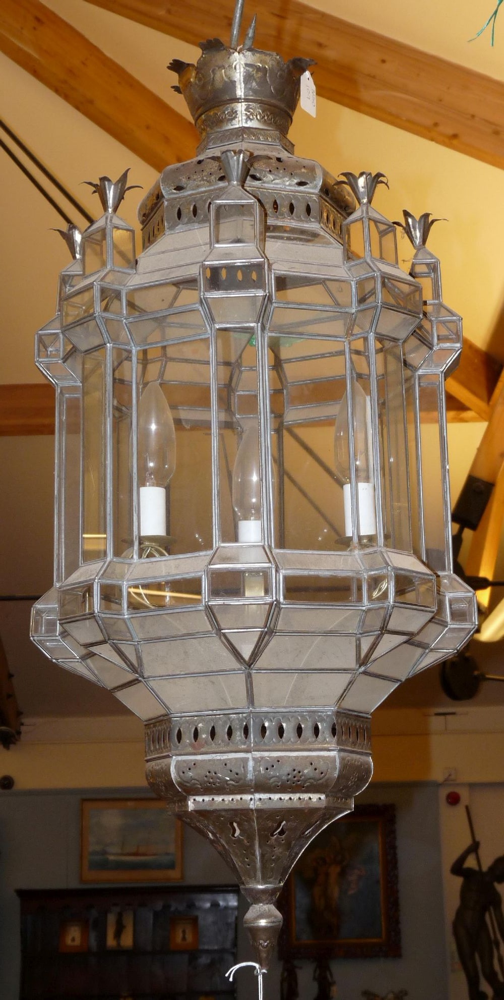 A Moroccan brass three light hanging lantern