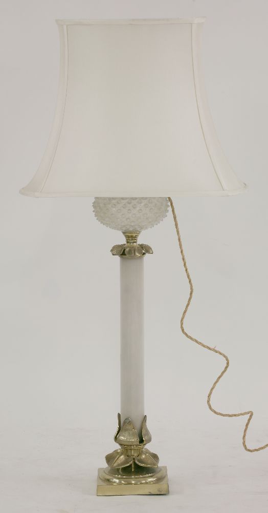 A late 19th century gilt bonze and glass oil lamp, with grey glass stem and opaline reservoir,