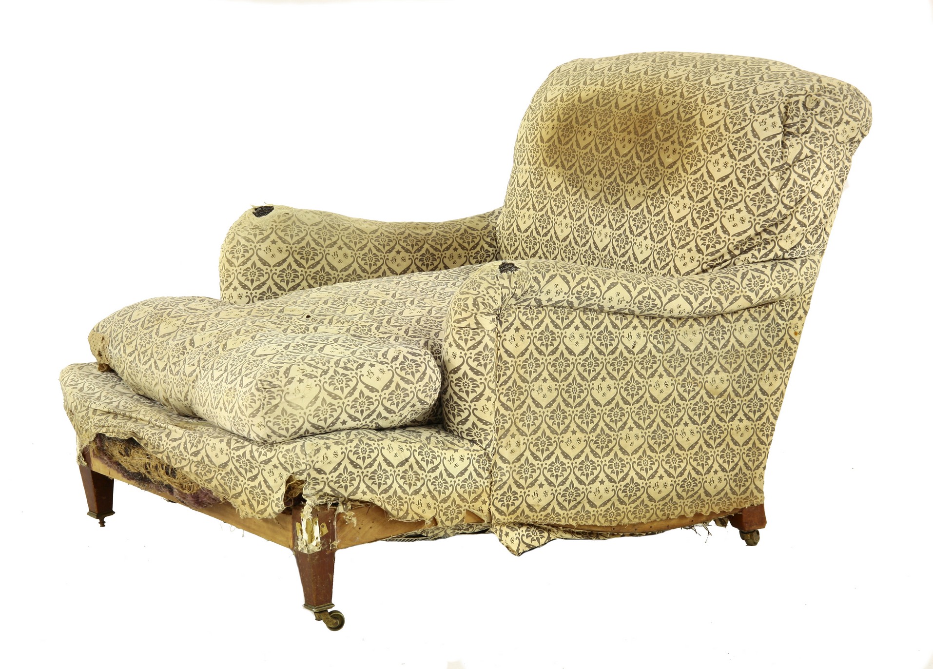 A Howard & Son armchair,
with original H&S printed fabric upholstery, stamped '19636 2303 Howard &