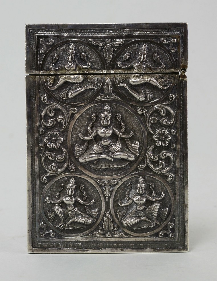 An Indian silver Card Case,
late 19th century, repoussé on each side with figures of Krishna and