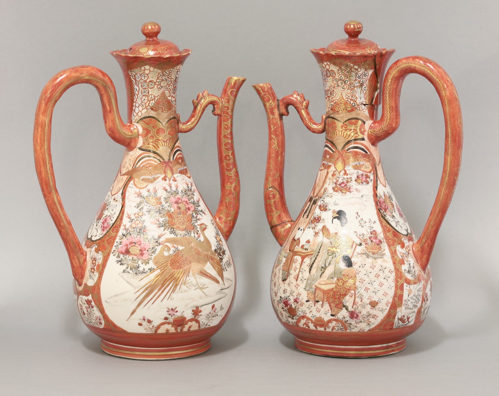 A pair of Kutani Ewers and Covers,
c.1880, each of large size and brightly enamelled and gilt with