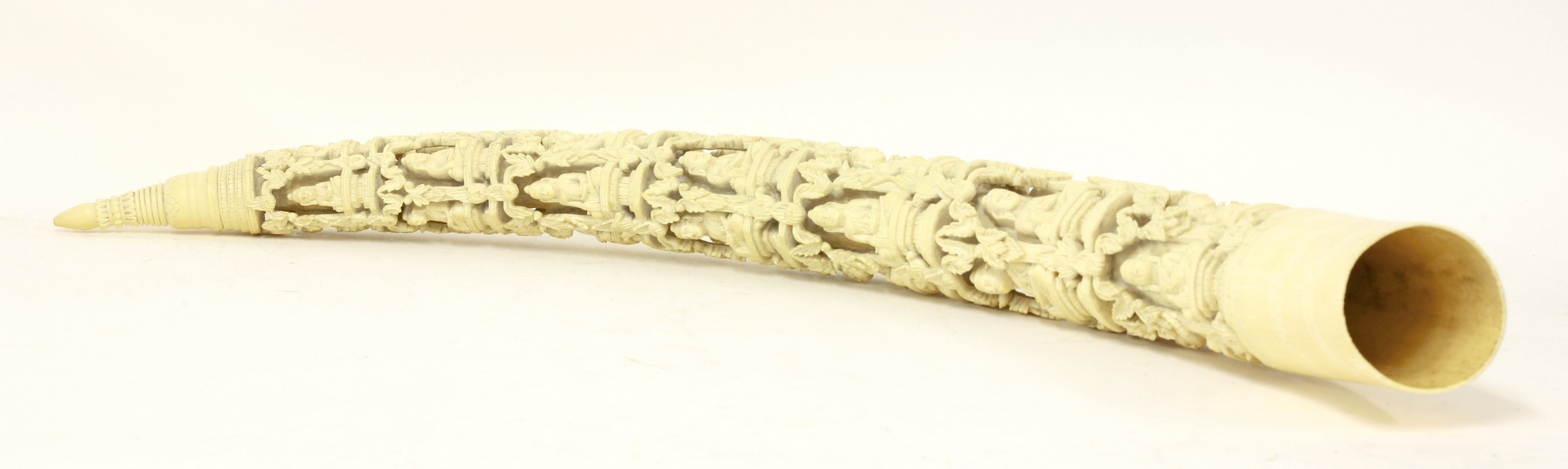 A good Burmese ivory Tusk Carving,
mid 19th century, in seven registers, each deeply carved with the