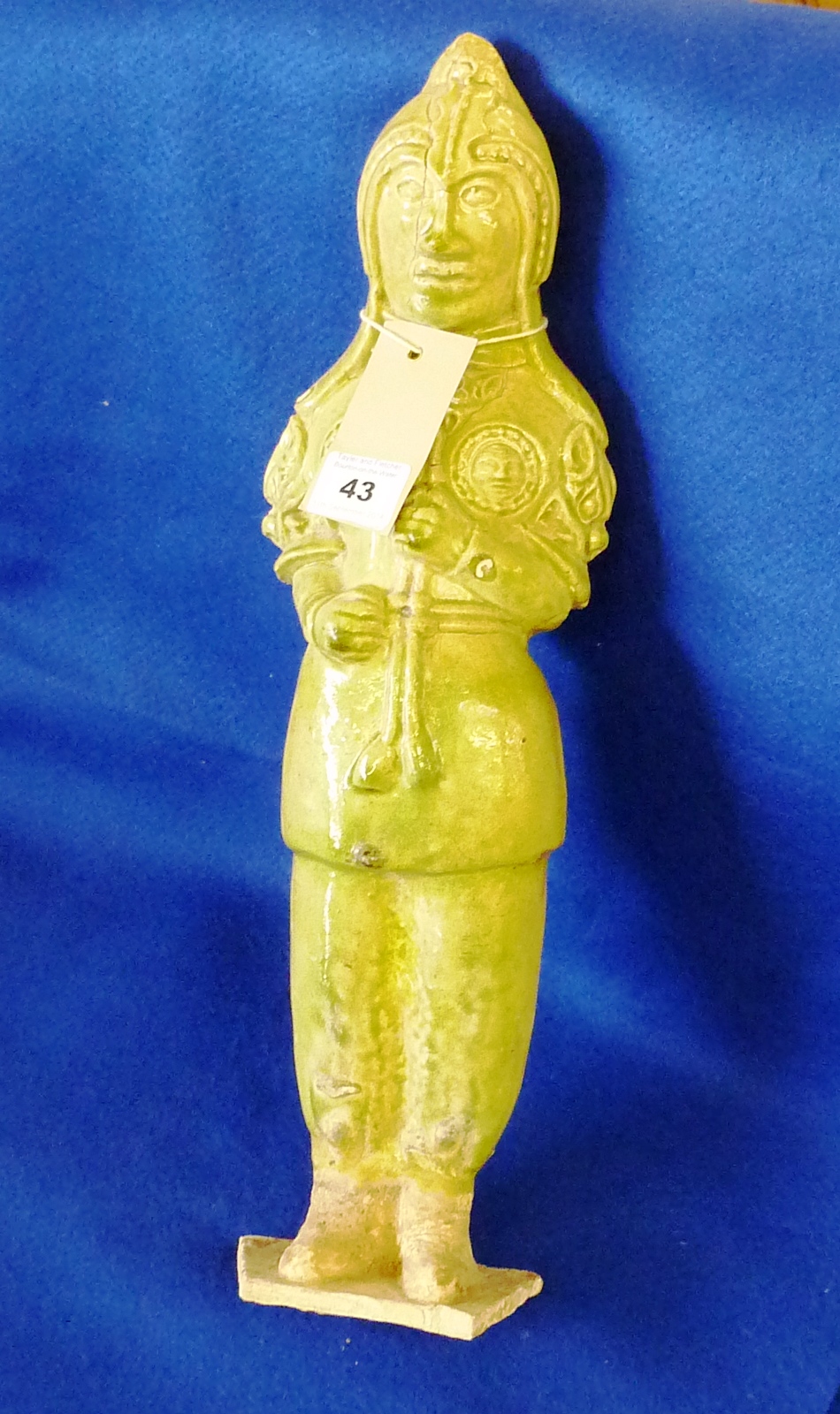 Sui Dynasty, a rare and finely modelled terracotta Figure of a military official, light green glaze