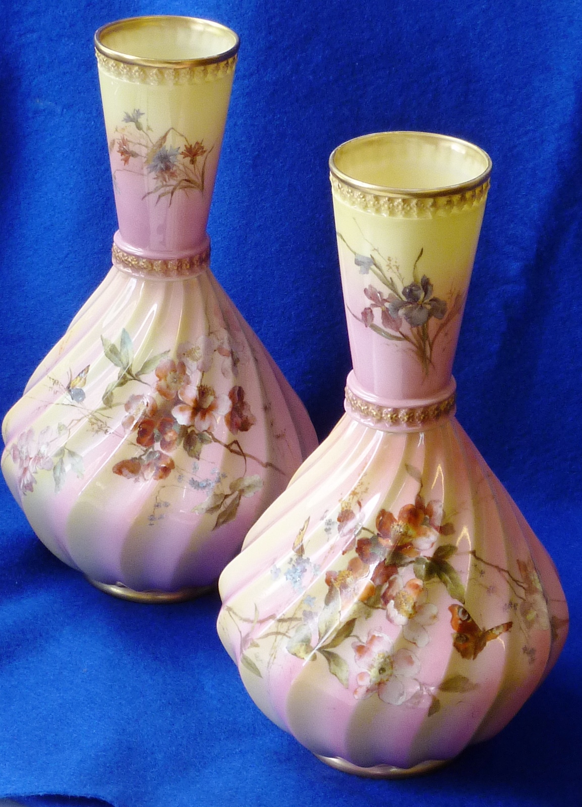 A pair of late 19th/early 20th Century Worcester ``shot`` enamel Vases, each with flowering conical