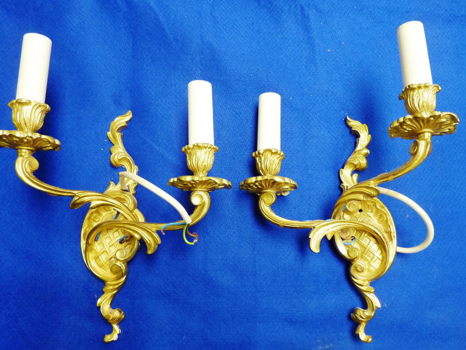 A pair of Louis XV style two branch heavy gilt metal Wall Appliques