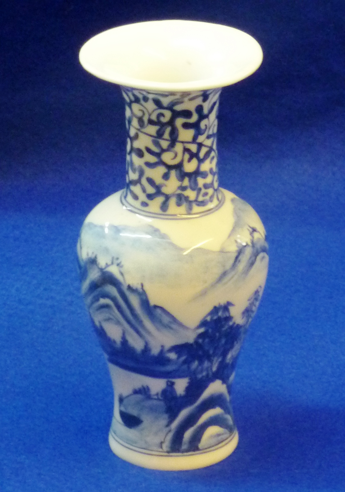 A Chinese porcelain Vase of baluster section, typically hand decorated in underglaze blue with a