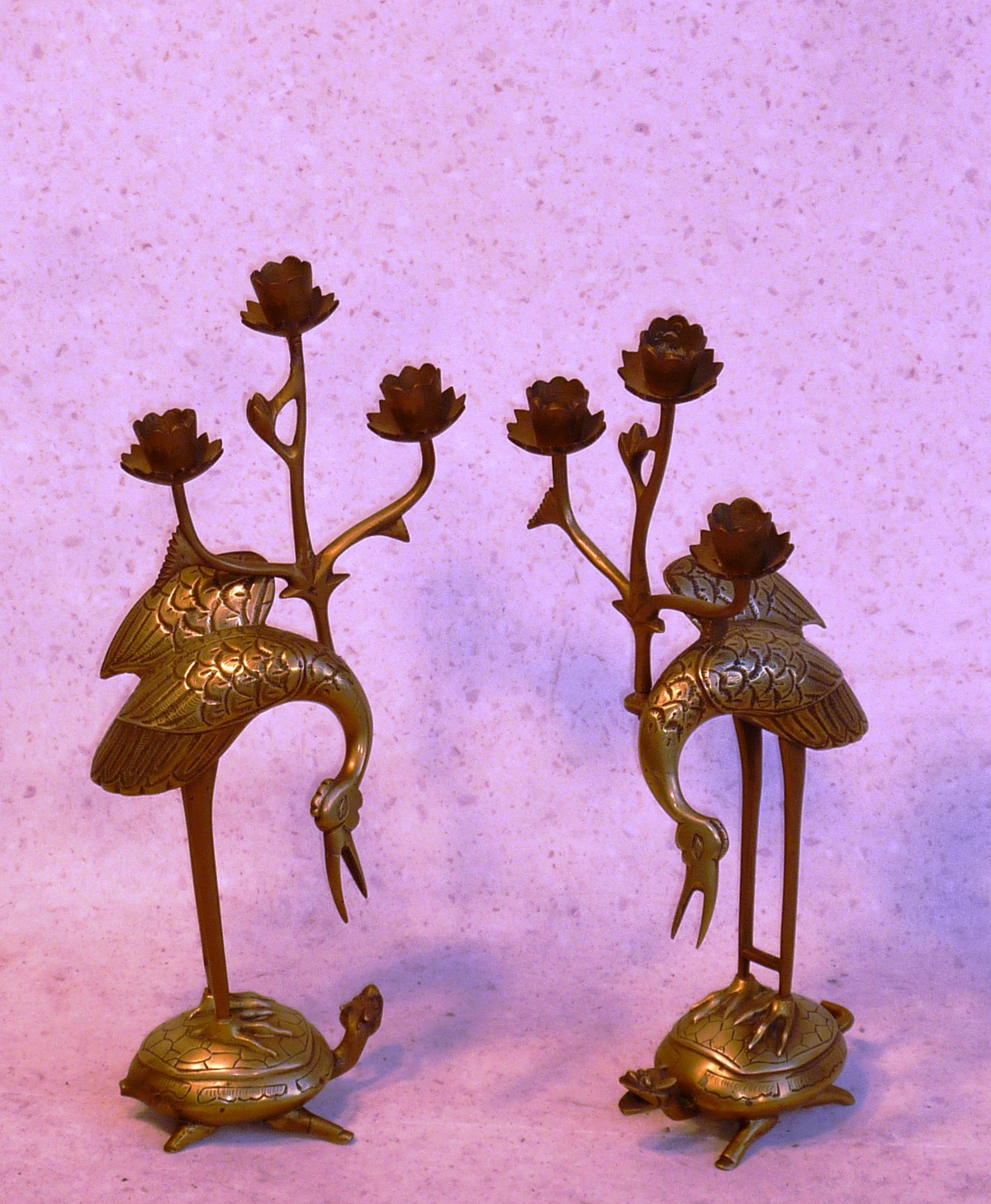 A pair of early/mid 20th Century Chinese brass three light Candelabra modelled as Storks upon the