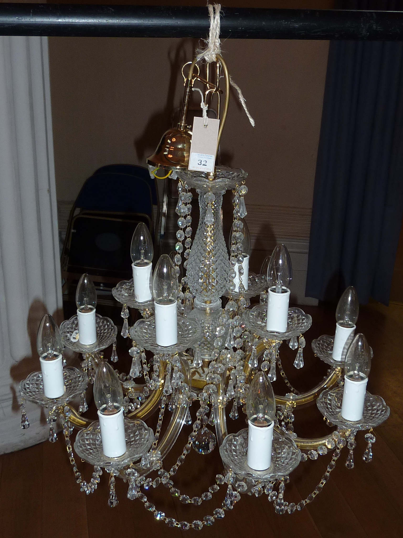 A nice quality (originally from Harrods) moulded and cut glass eleven light Chandelier (in two