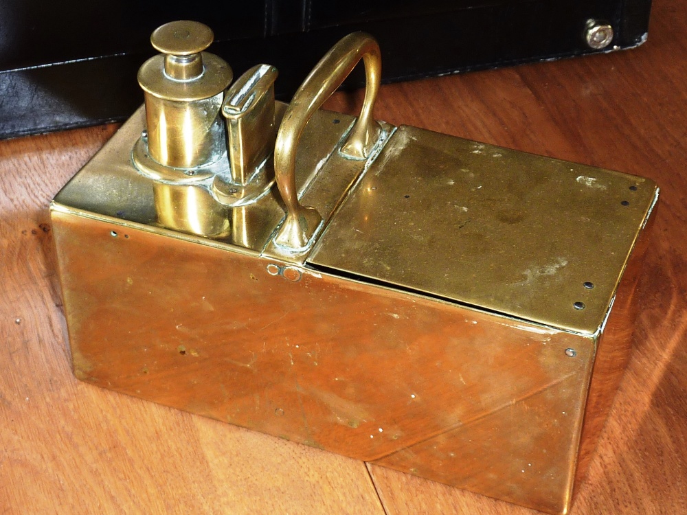 An intriguing early 19th Century heavy brass Tobacco Dispenser with carrying handle, makers name (