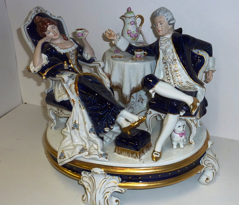 A massive Royal Dux Porcelain Figure Group, two figures, male and female in 18th Century dress