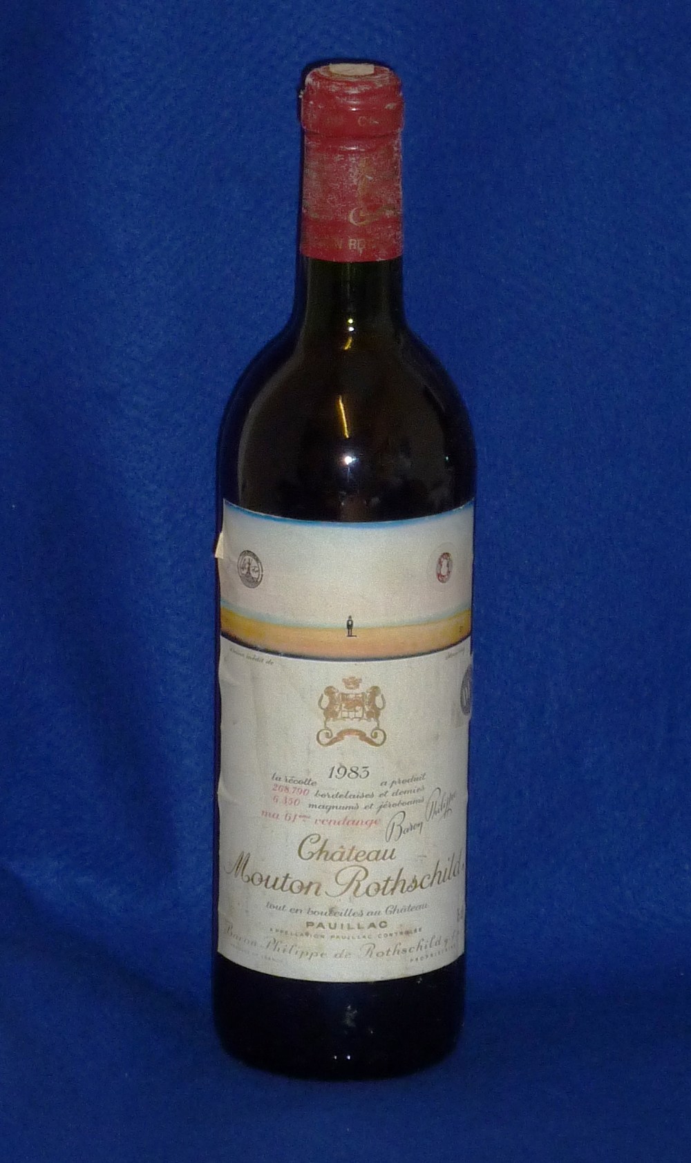 A Bottle of 1983 Chateau Mouton Rothschild