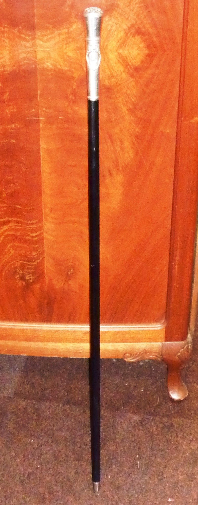 A Sword Stick with silver mounted handle, the handle with hinged lid opening to reveal interior with