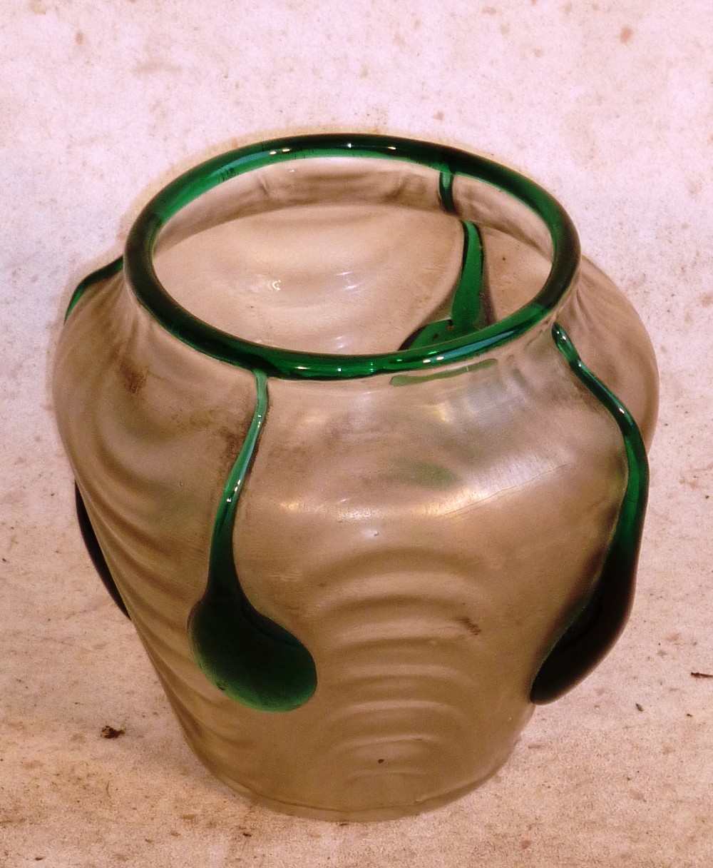 An early 20th Century Loetz style glass Vase, iridescent body with green trailing tear drop shaped