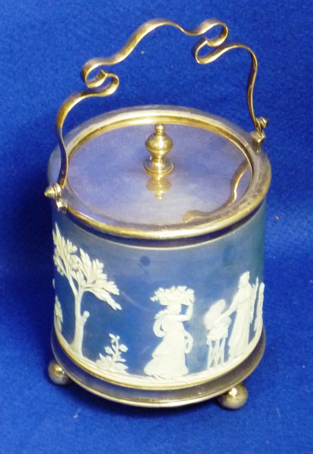 An early 20th Century Wedgwood blue Jasperware and silver plated mounted Biscuit Barrel typically