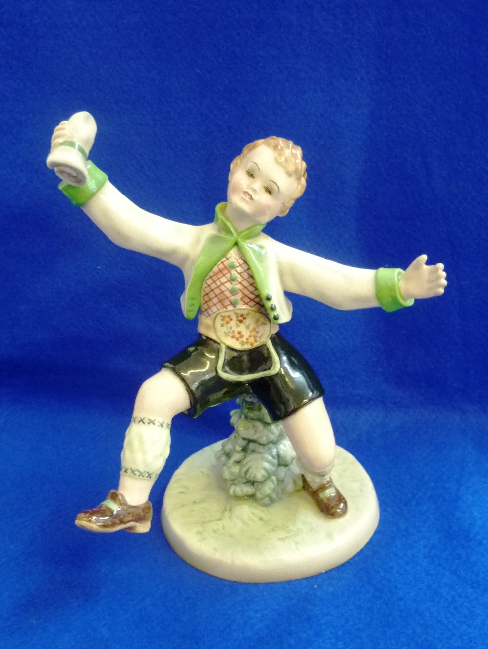 An early 20th Century Goldscheider (Austrian) Model of a young boy in German dress, restored hand,