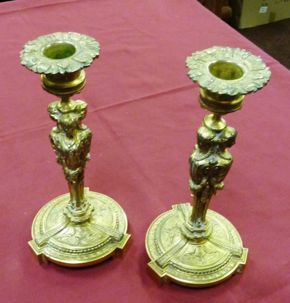 A pair of French 19th Century gilded (possibly bronze) 
Candlesticks, the stems modelled as female