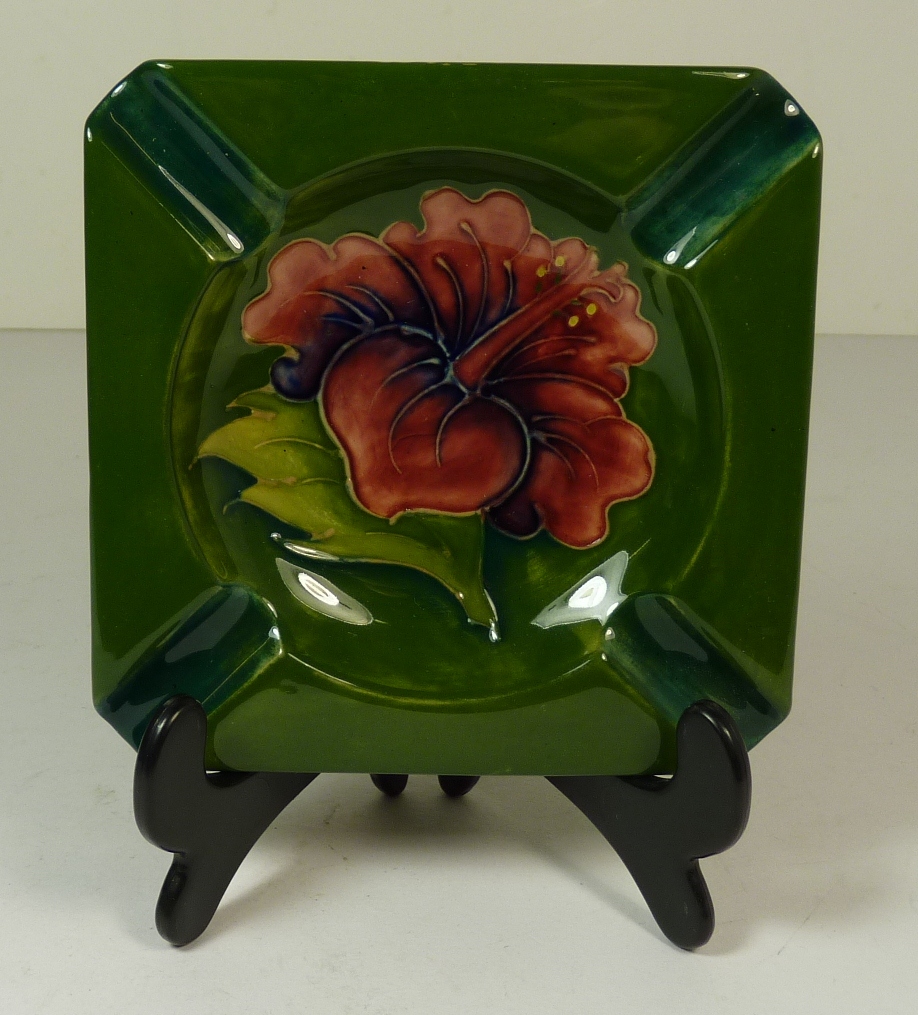 A Moorcroft ashtray, Hibiscus pattern, impressed marks to the back, 12cms wide ++good
