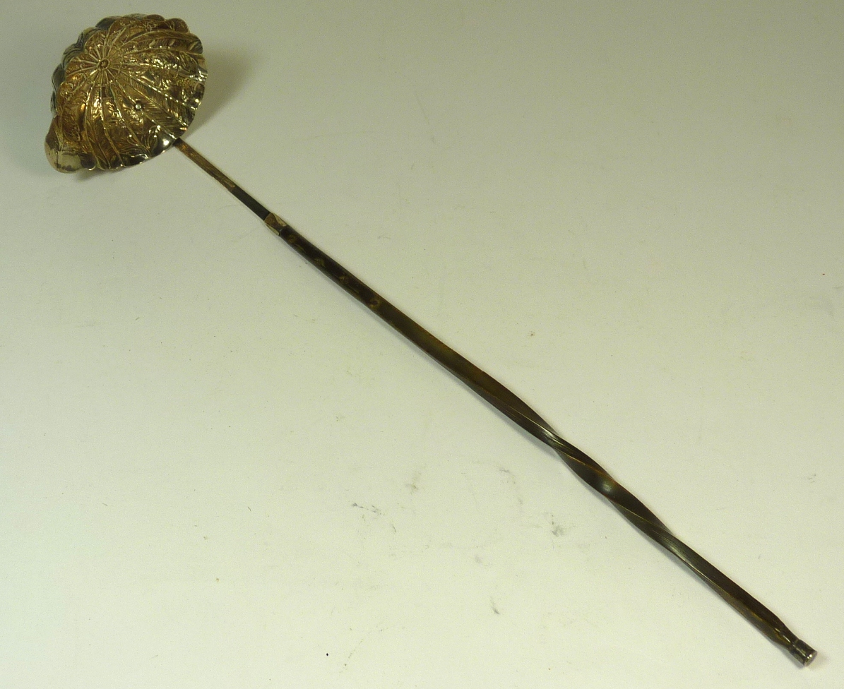 An early 19th Century toddy ladle with decorative silver bowl (unmarked, tests as silver), the stem