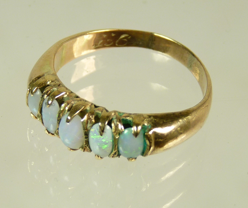 A 9ct gold and opal ring