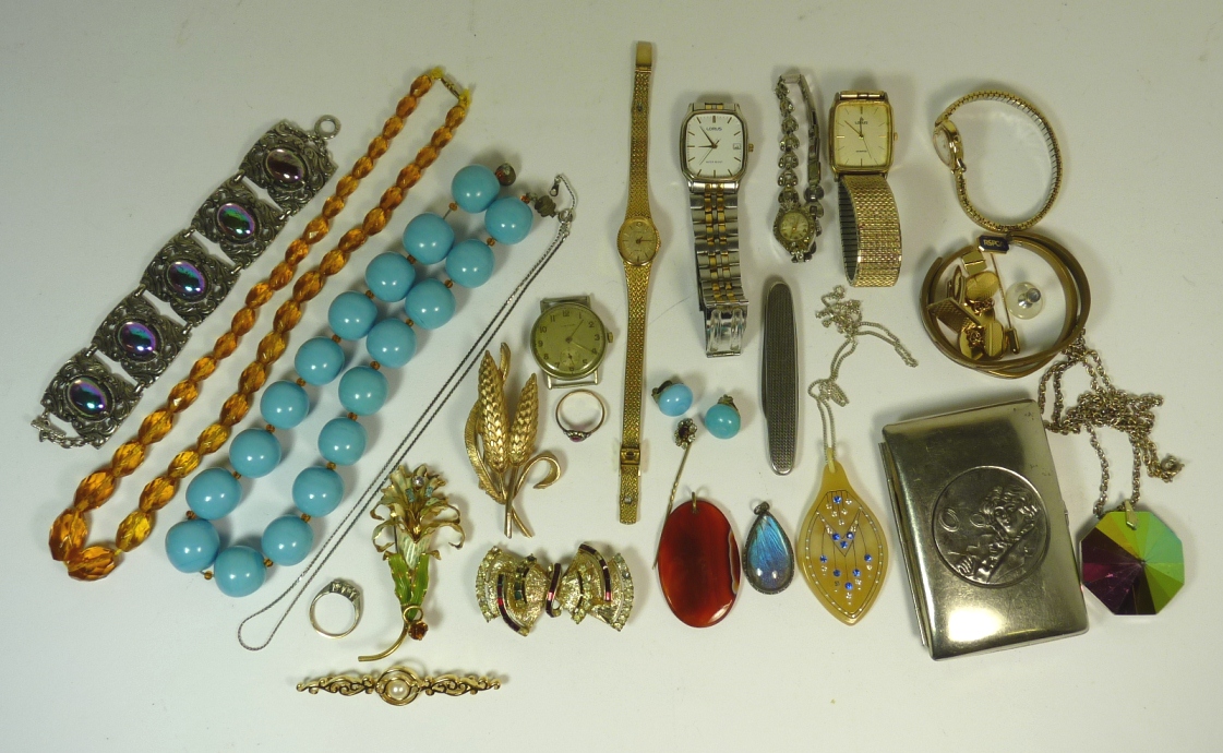 A quantity of mixed costume jewellery including an Art Deco paste set celluloid pendant; silver