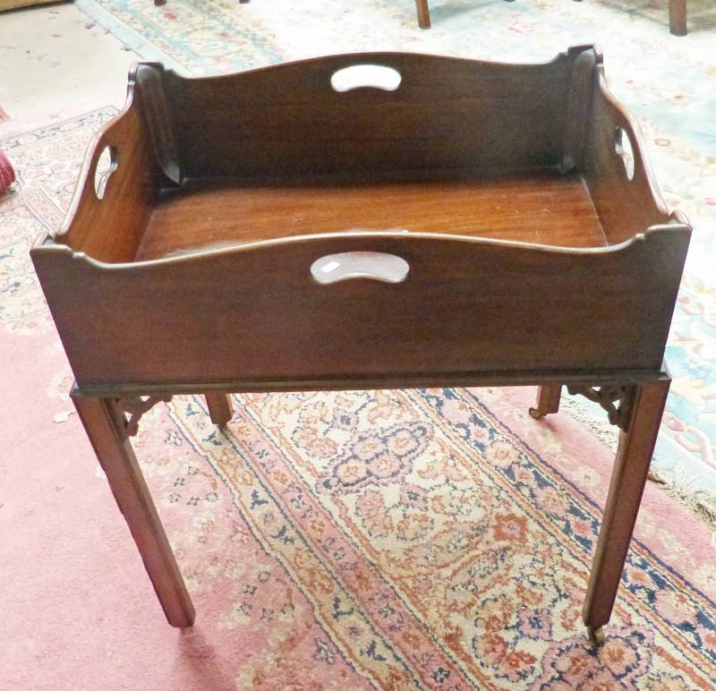 19TH CENTURY MAHOGANY BOOK TROUGH ON SQUARE SUPPORTS