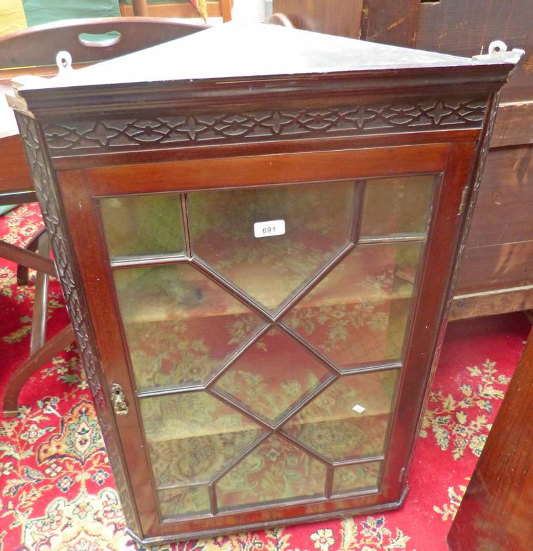 LATE 19TH CENTURY MAHOGANY CORNER CABINET WITH ASTRAGAL GLASS DOOR