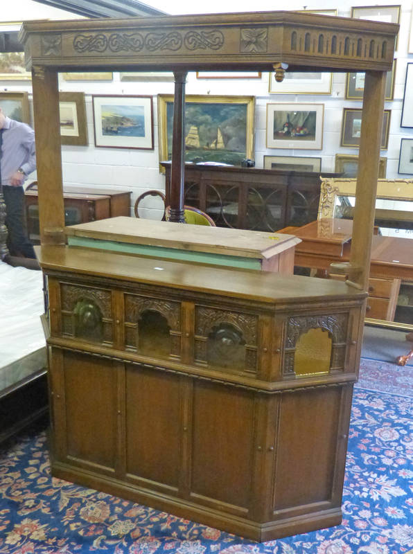 20TH CENTURY OAK BAR WITH AMBER GLASS PANELS & CARVED DECORATION