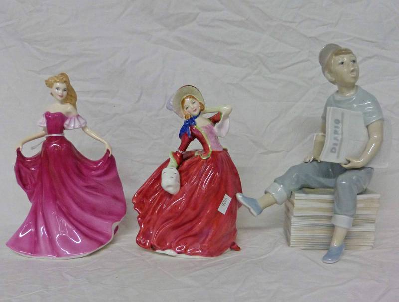 TWO DOULTON FIGURES: HN 1934 AUTUMN BREEZES AND EMMA HN3714 AND A NAO FIGURE OF SEATED BOX WITH