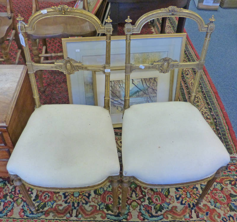 PAIR 19TH CENTURY GILT HAND CHAIRS WITH DECORATIVE CARVED BACK & REEDED SUPPORTS