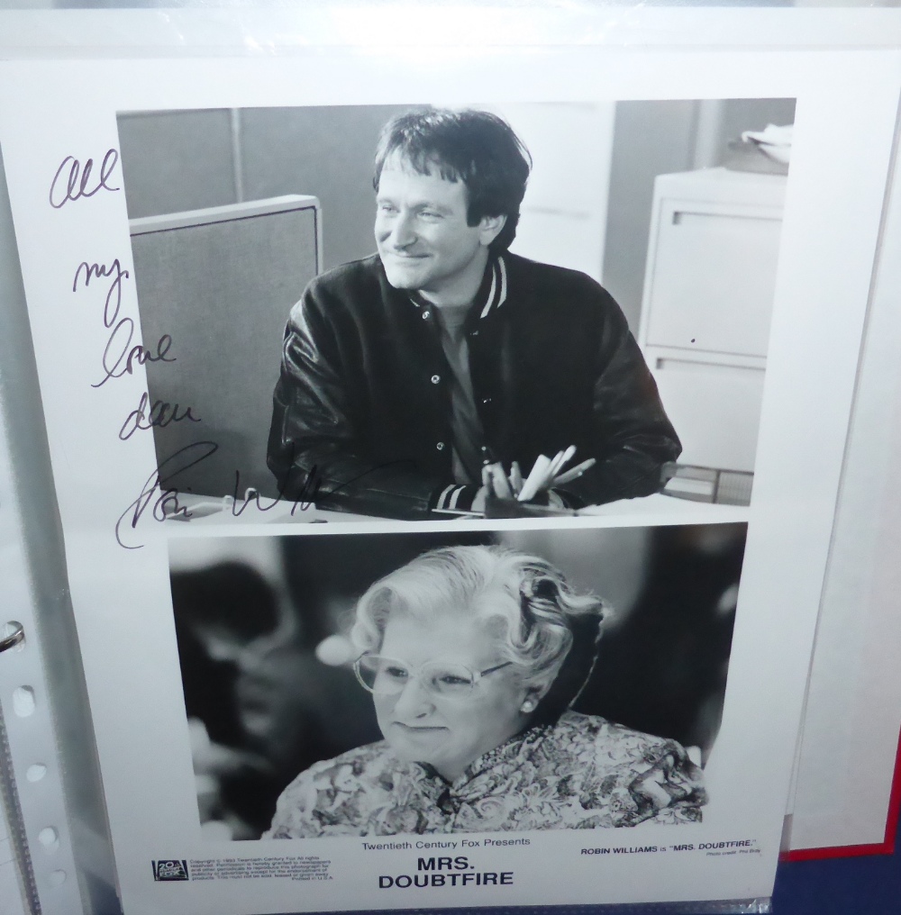 A Large Collection of Signed Photographs of Celebrities, mainly entertainers, including Elton John,