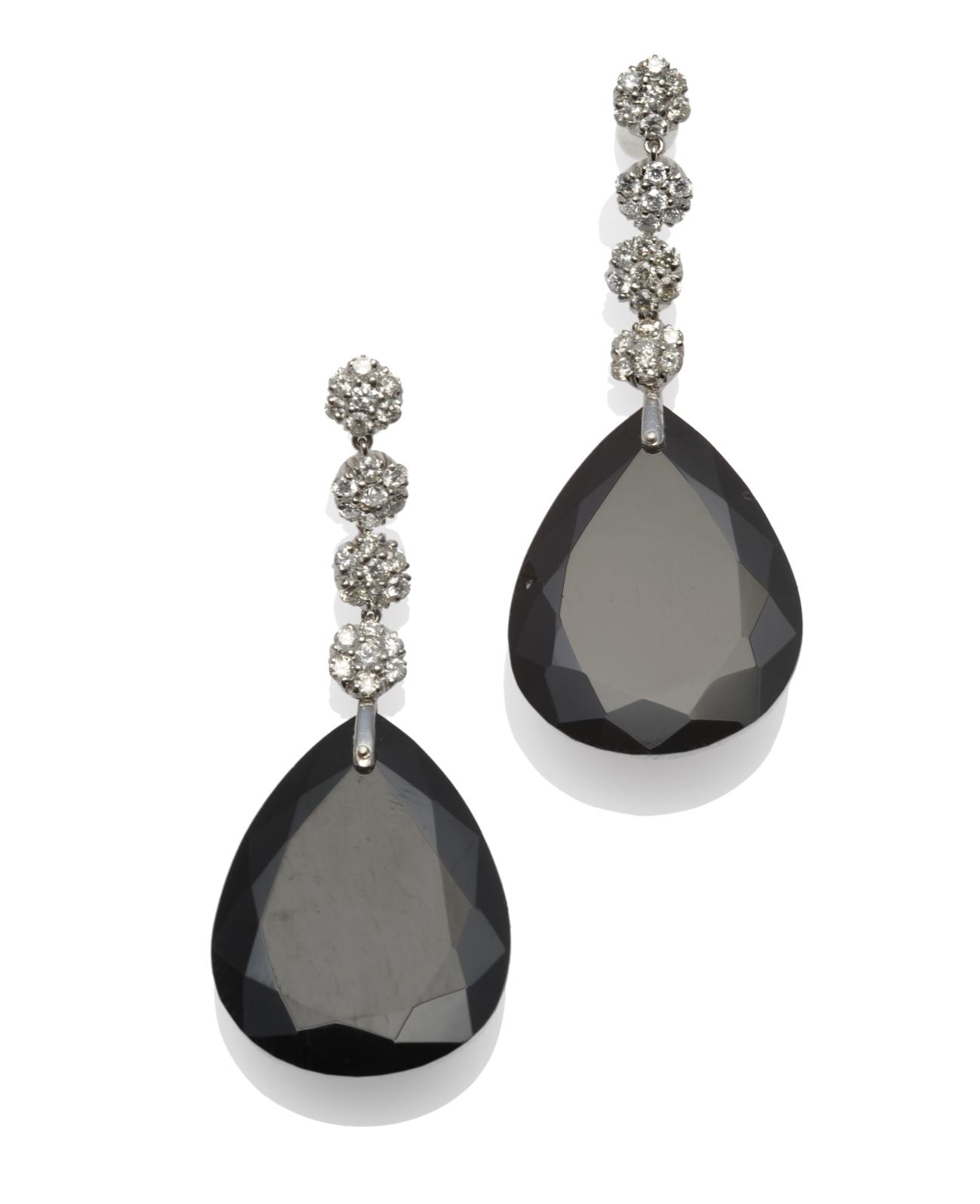 A Pair of 18 Carat White Gold Onyx and Diamond Drop Earrings, four chain linked clusters of round