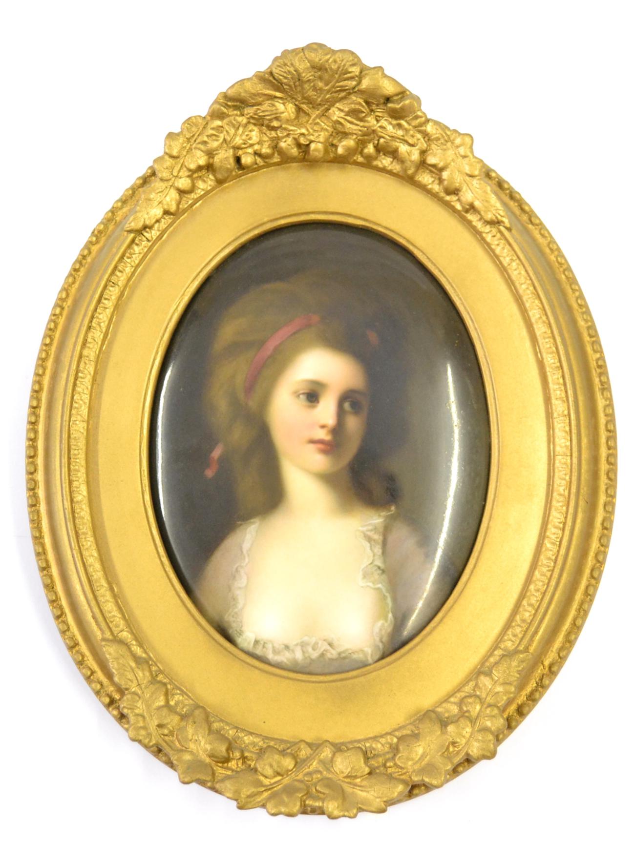 A KPM Berlin Porcelain Oval Plaque, circa 1880, painted with a bust portrait of a girl in a