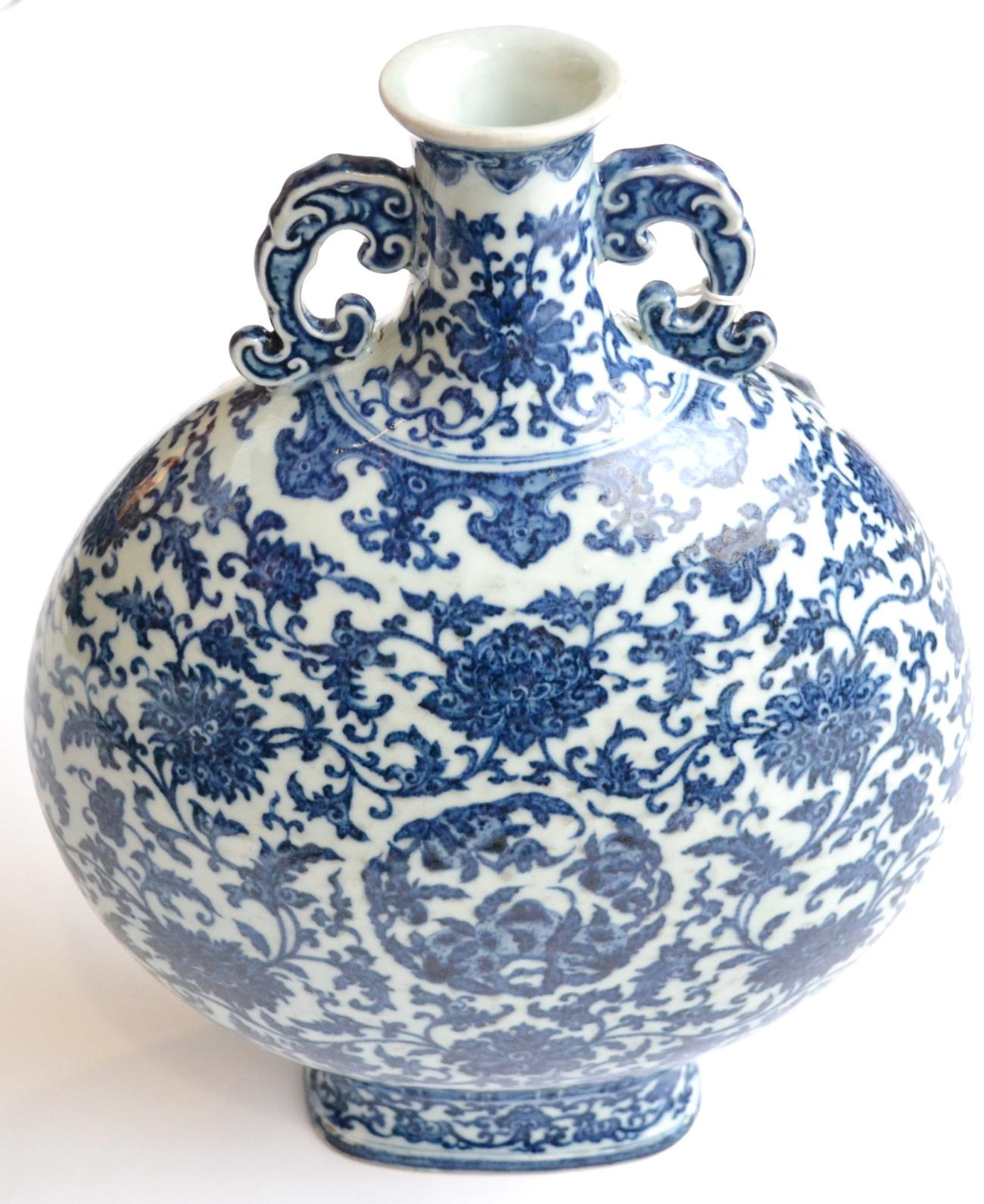 A Chinese Porcelain Moon Flask, Qianlong reign mark but not of the period, with twin scroll