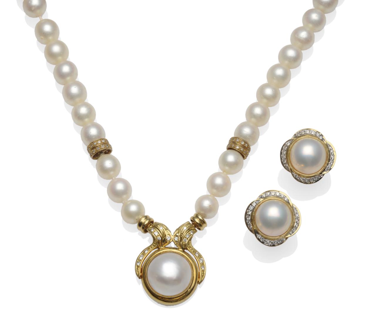 A Cultured Pearl Necklace with Mabe Pearl and Diamond Centrepiece, the uniform cultured pearls with