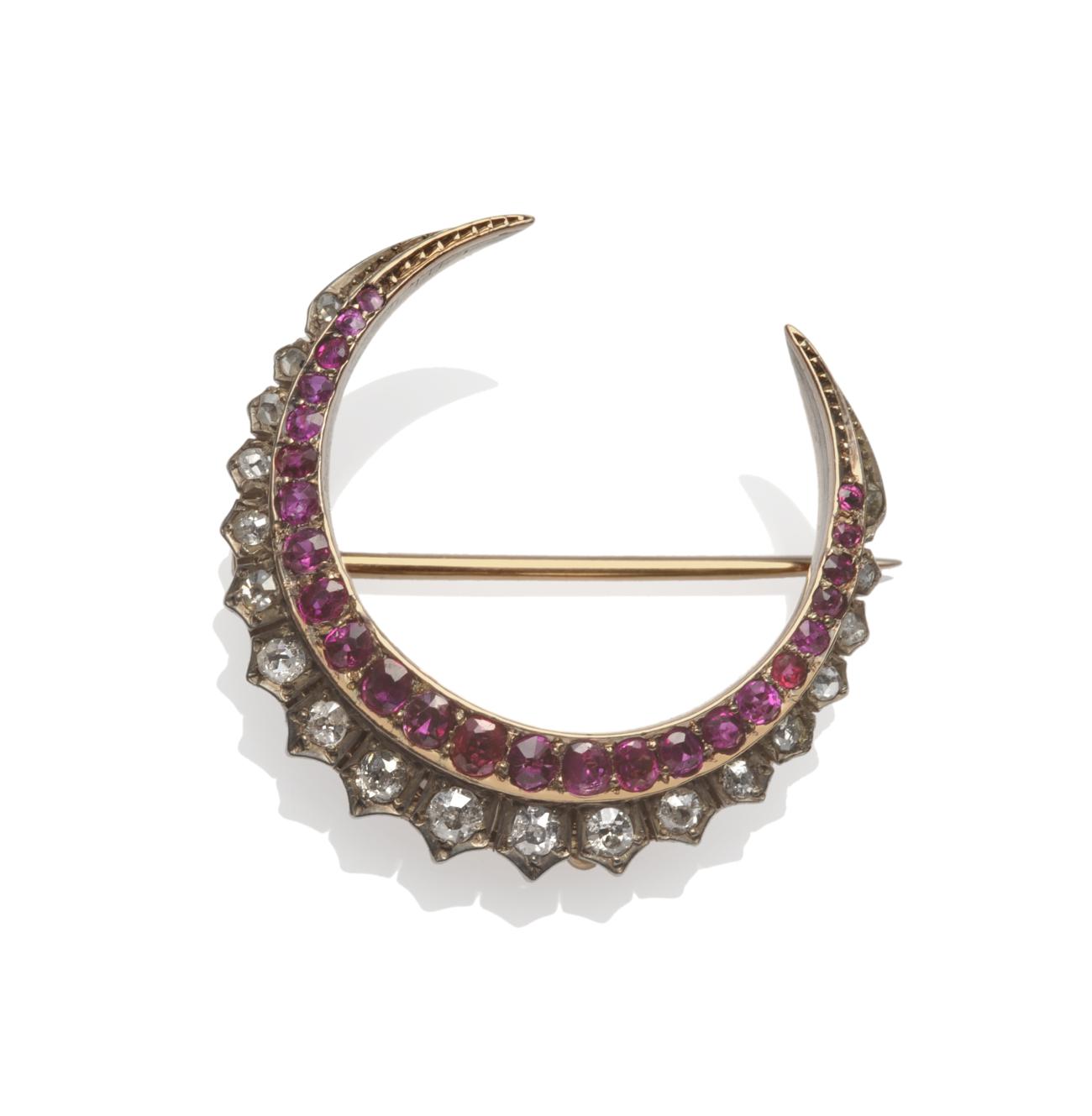 A Ruby and Diamond Crescent Brooch, circa 1880, the inner curve set with graduated mixed cut