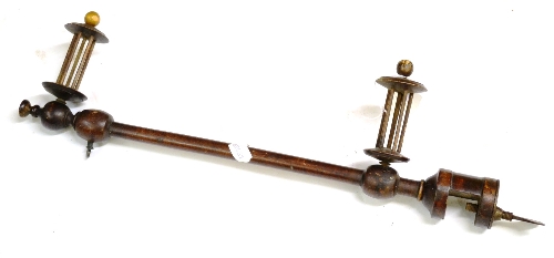 An 18th Century Walnut Wool Winder, with two spools and an iron screw clamp for fastening to a