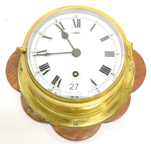 Brass Cased Ship`s Clock  with Roman numeral dial, key wind on face and slow-fast adjuster 6``,