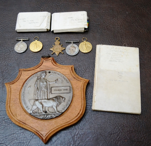A First World War Pair and Memorial Plaque, awarded to 26-1381 PTE.W. (WILLIAM) TATE. NORTH`D FUS.,