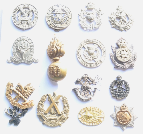 A Collection of Fifteen Canadian Cap Badges 1900 - 1914, in brass, bronze, bi-metal and white