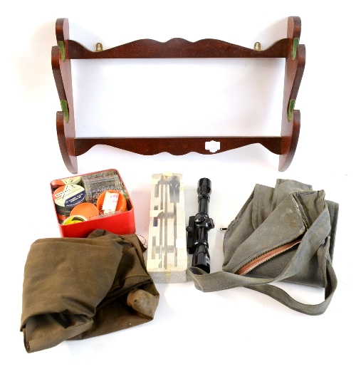Accessories, comprising a mahogany wall mounted gun rack, a Rhino 4x32 rifle scope, an air gun
