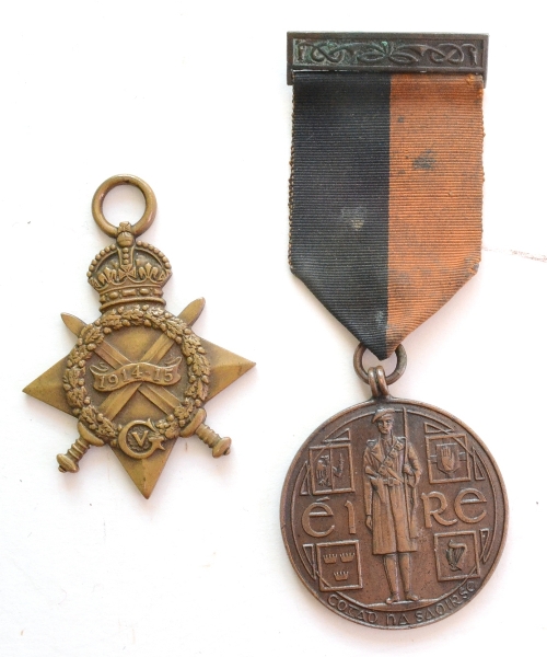 An Irish General Service Medal, awarded to VOLUNTEER W.DUNNE K.COY. 3RD BATTn. I.R.A. and a 1914-15