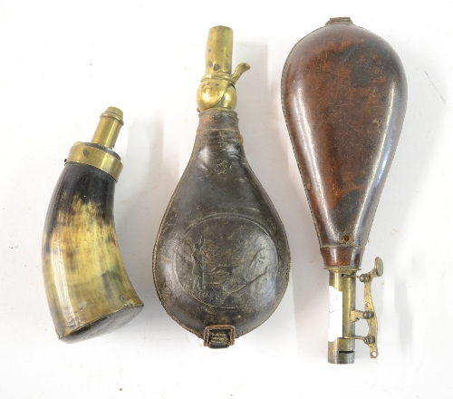 A 19th Century Horn Powder Flask, with brass charger and external spring; two 19th Century Leather